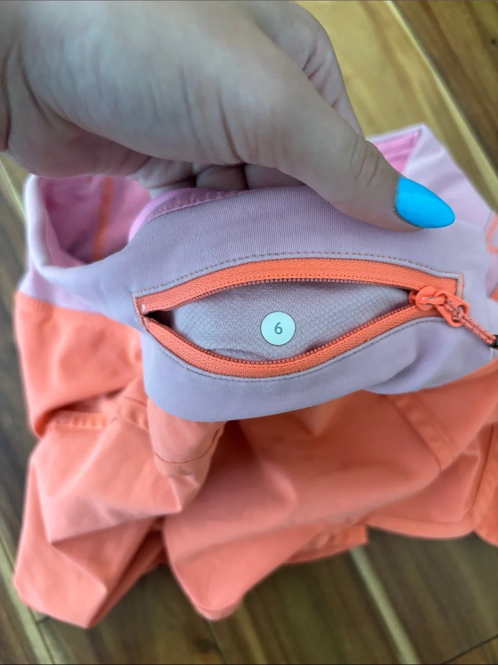 Discontinued lululemon athletica Coral Shorts with Light Pink Waistband